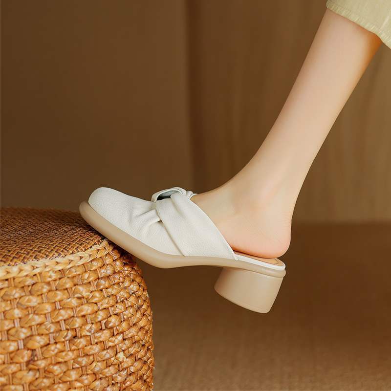 Gentle and soft textured twisted toe box mid-heel mule sandals