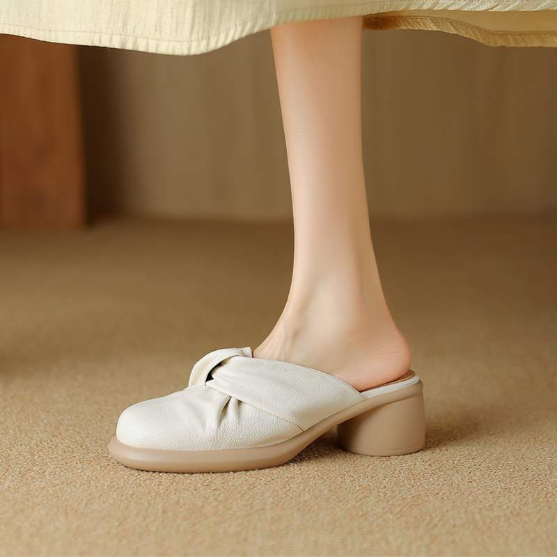 Gentle and soft textured twisted toe box mid-heel mule sandals